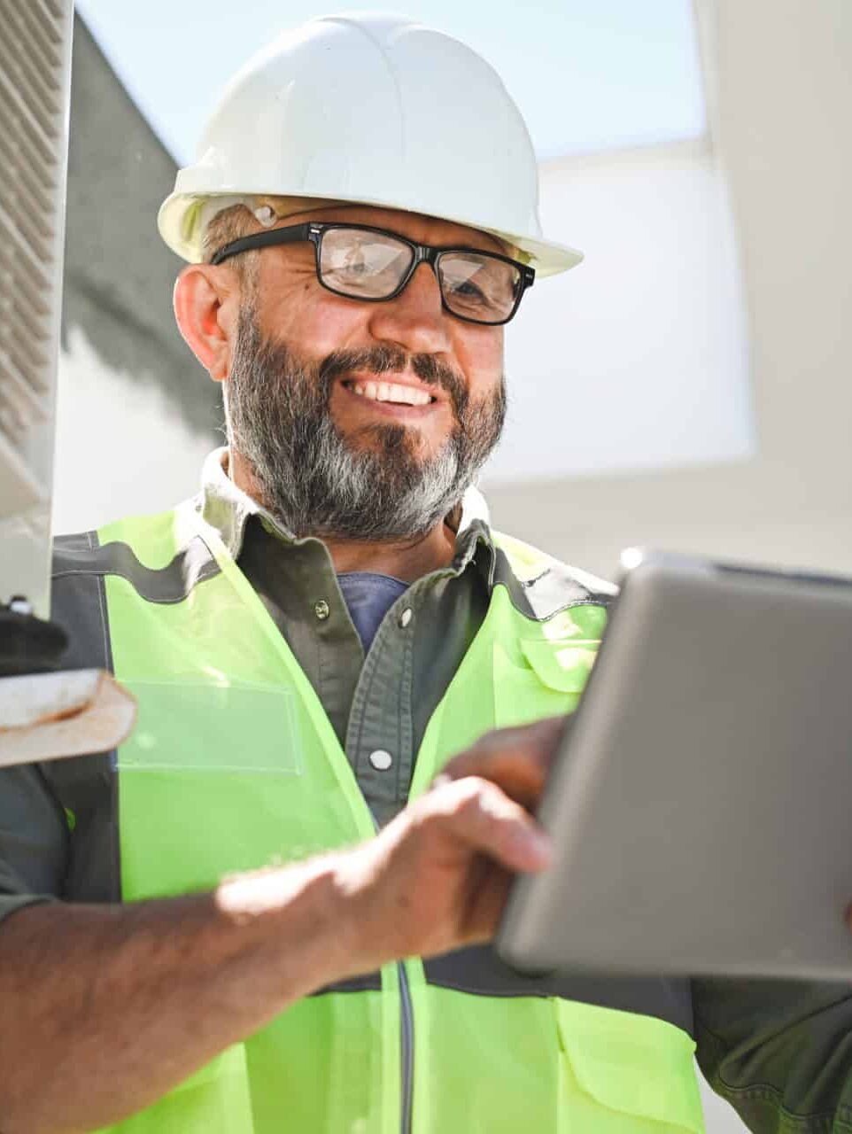 HVAC professional repairs air conditioner